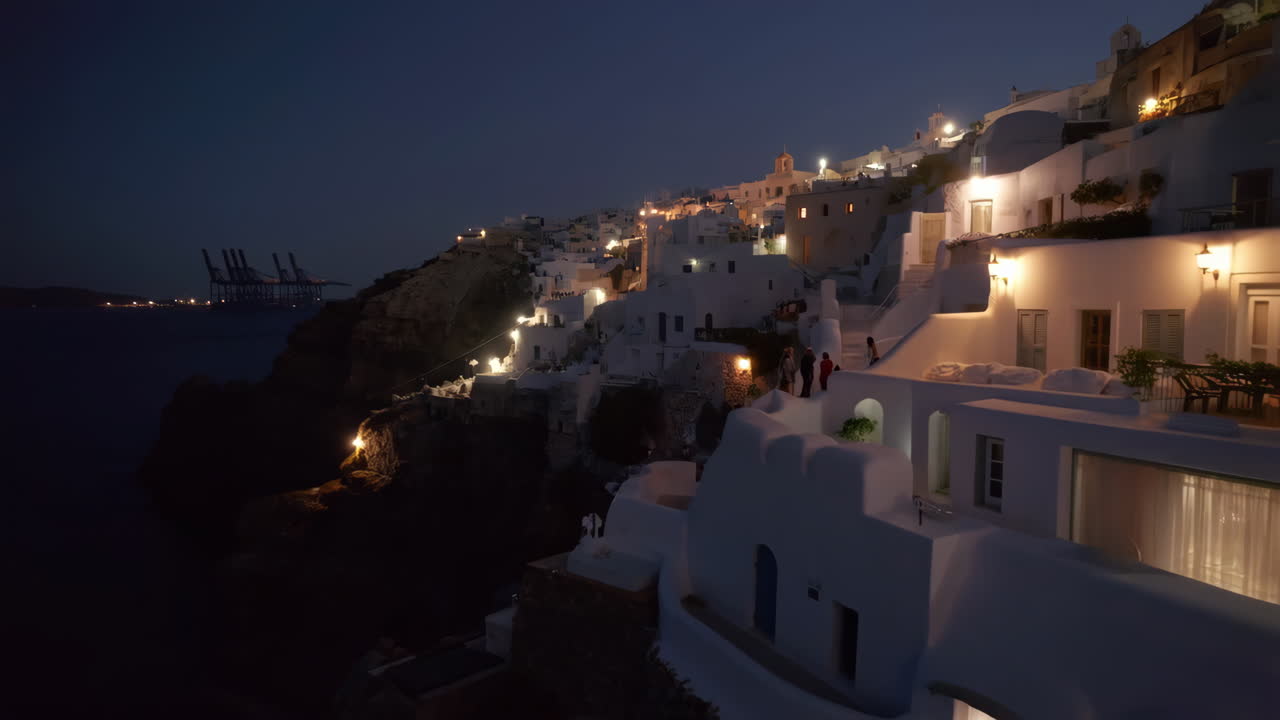 Santorini Village Illuminated at Night Overlooking the Aegean Sea