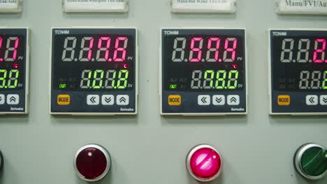 craft beer production factory, brewery manufacture. putting barley malt grains in conveyor close-up. brewing, cooking alcohol in metal vats bottles