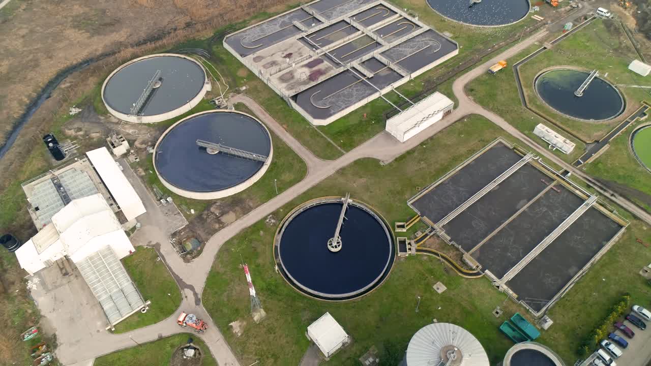 Waste water treatment plant. Sewage processing tanks.
