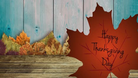 Animation-of-happy-thanksgiving-day-text-over-leaves