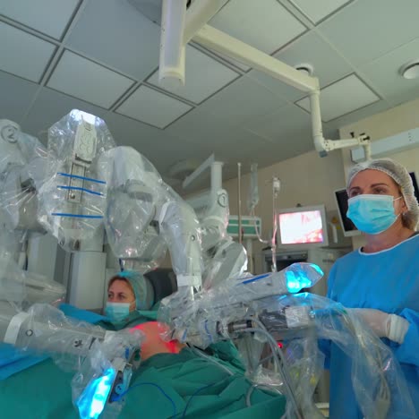 modern medical equipment with robotic arms. minimally invasive robotic surgery in clinic. operating room with modern medicine. doctors control the work of medical robot