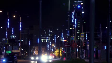 city street at night with colorful led lights