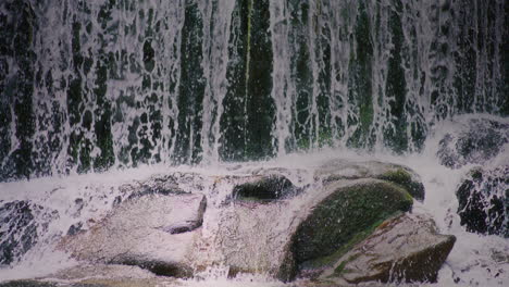 close-up of mountain waterfall and water drops