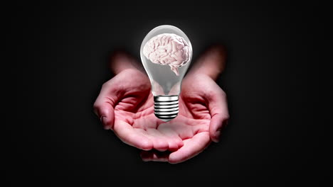 Hands-presenting-light-bulb-with-brain