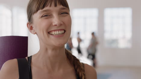 portrait beautiful caucasian woman laughing enjoying yoga class practicing healthy lifestyle in fitness studio