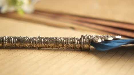 ornate vintage fountain pen on aged paper