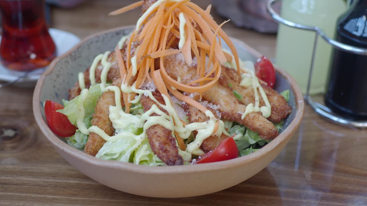 Chicken salad with carrots and tomatoes