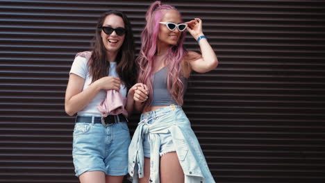 two friends laughing outdoors