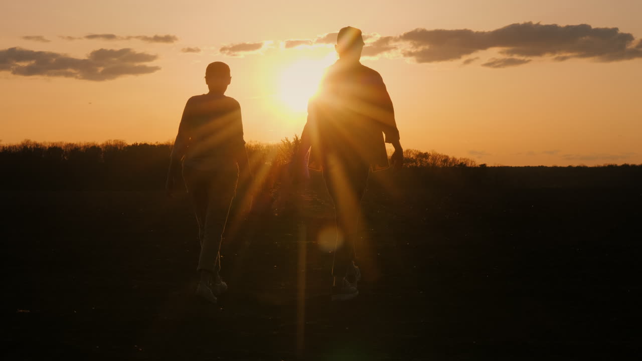 Couple Walking Towards Sunset