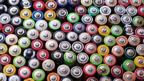 top view of a group of used aa batteries top view of a group of used aa batteries alkaline batteries used