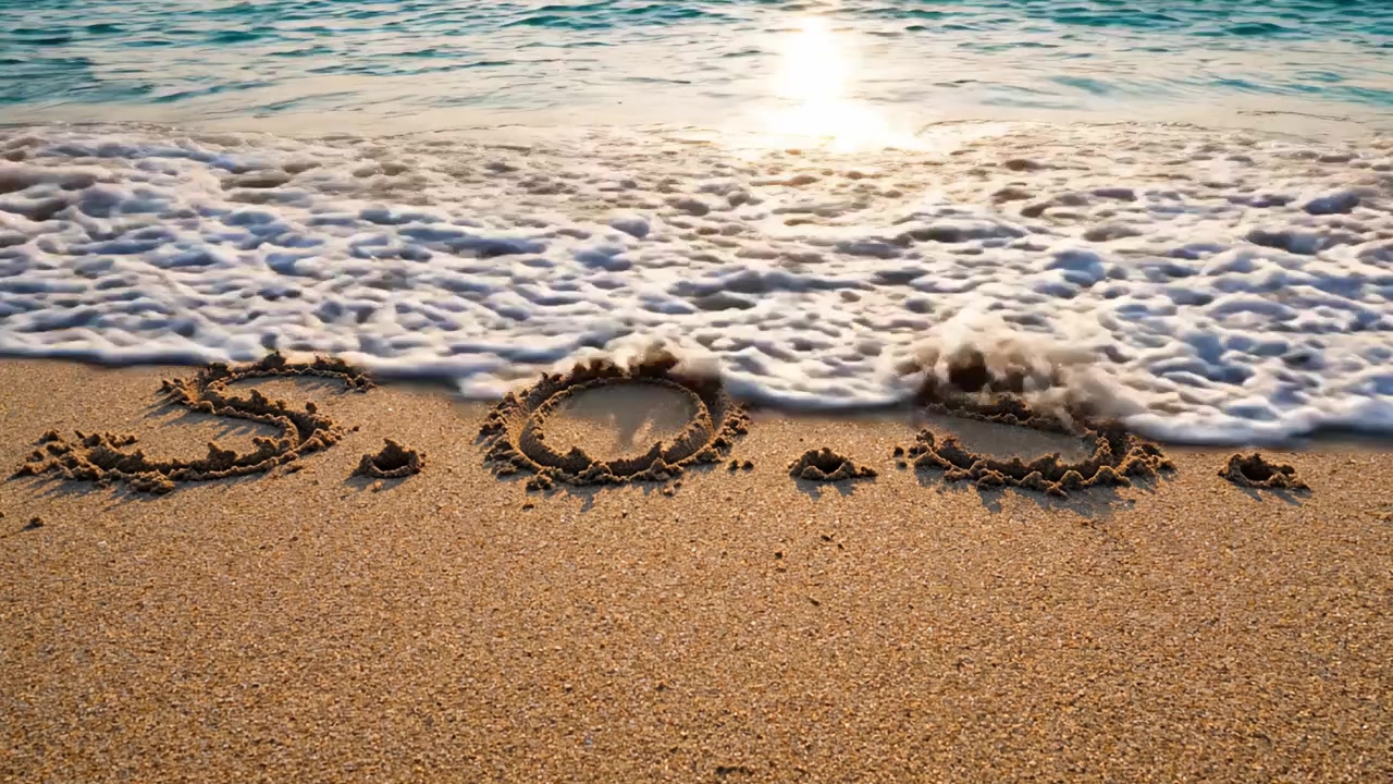 A Distress Signal Inscribed in Soft Sand on a Serene Beach, Highlighting a Message of Urgency Between Gentle Waves and a Glimmering Sunset.