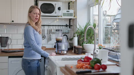 a woman is preparing a healthy meal in the kitchen
