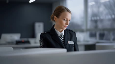 Woman in Uniform Working in an Office Setting