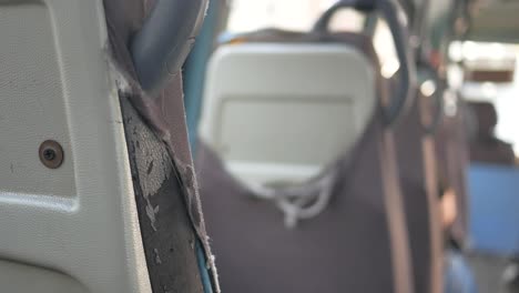 close-up of a torn bus seat