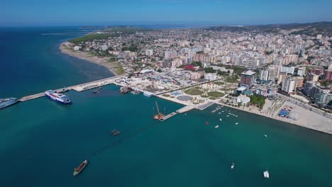 Vlora,-Albania:-Exploring-the-Beautiful-Coastal-City-with-a-Scenic-Promenade,-Bustling-Port,-and-the-Serene-Blue-Sea-Lagoon