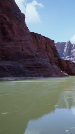 a scenic view of a canyon with a river flowing through it