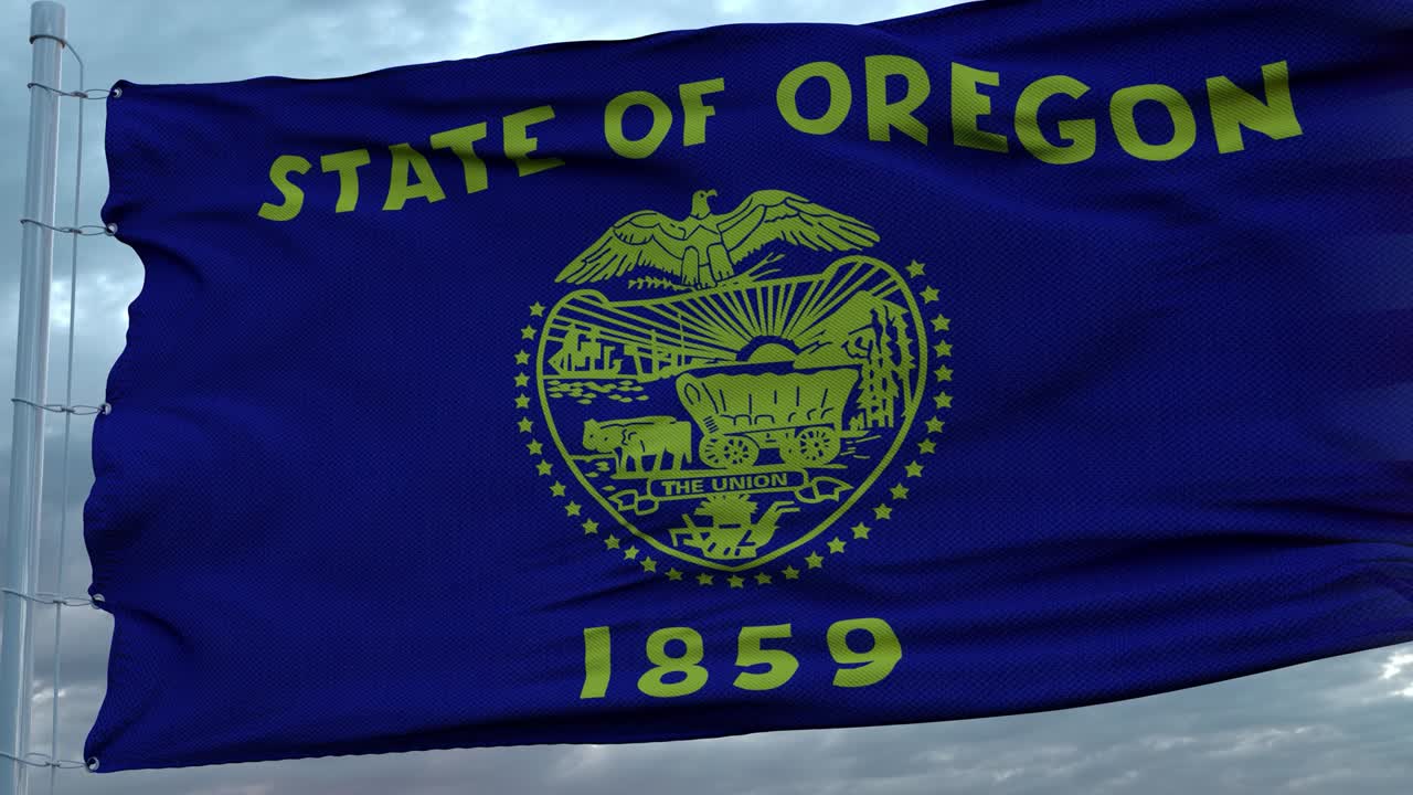 미국과 오리건의 혼합 발이 바람에 흔들리고 있습니다. 오리건과 미국 발은 발 기둥에 있습니다.