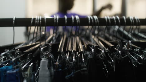 Clothes-on-hangers-in-a-store