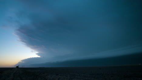 Massive Storm Clouds Over Plains Landscape