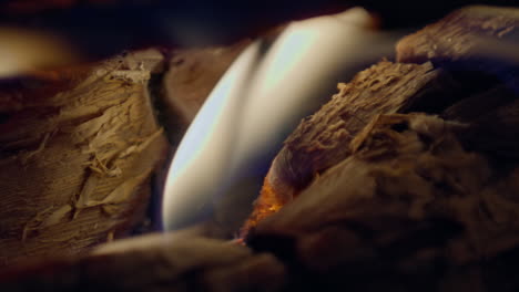 slow motion shot of flames and embers in a fireplace