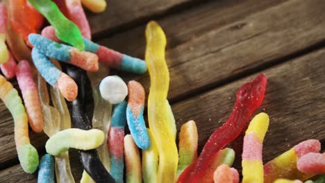 gummy candies on a wooden table 4k