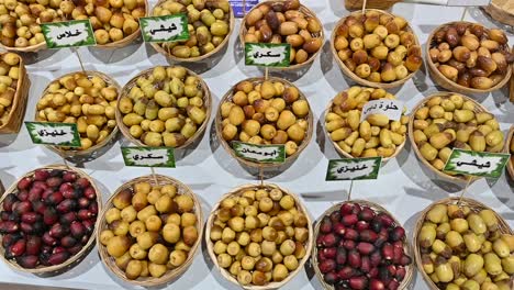 varieties of fresh emirati dates are displayed during the dates festival in the united arab emirates