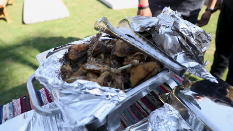 grilled chicken on a big plate in the garden - push in