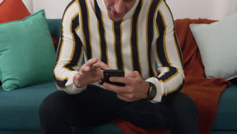 caucasian man using his phone