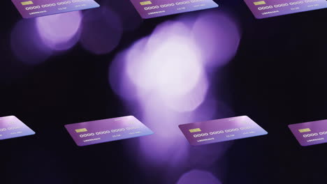 animación de tarjetas de crédito sobre puntos de luz sobre fondo negro