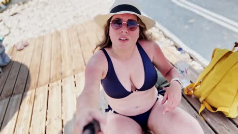 greek island getaway: tourist tans at athens beach