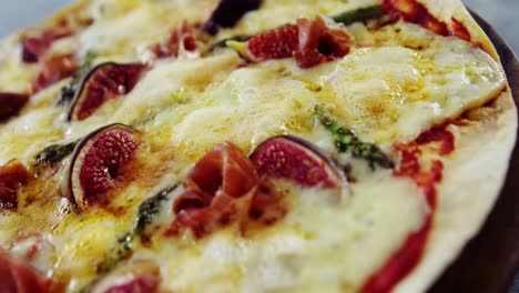 baked pizza with fig toppings