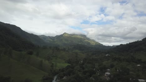 Drone-aerial-hyperlapse-of-a-beautiful-landscape-view-with-mountains-and-a-river-in-Guatemala,-central-america