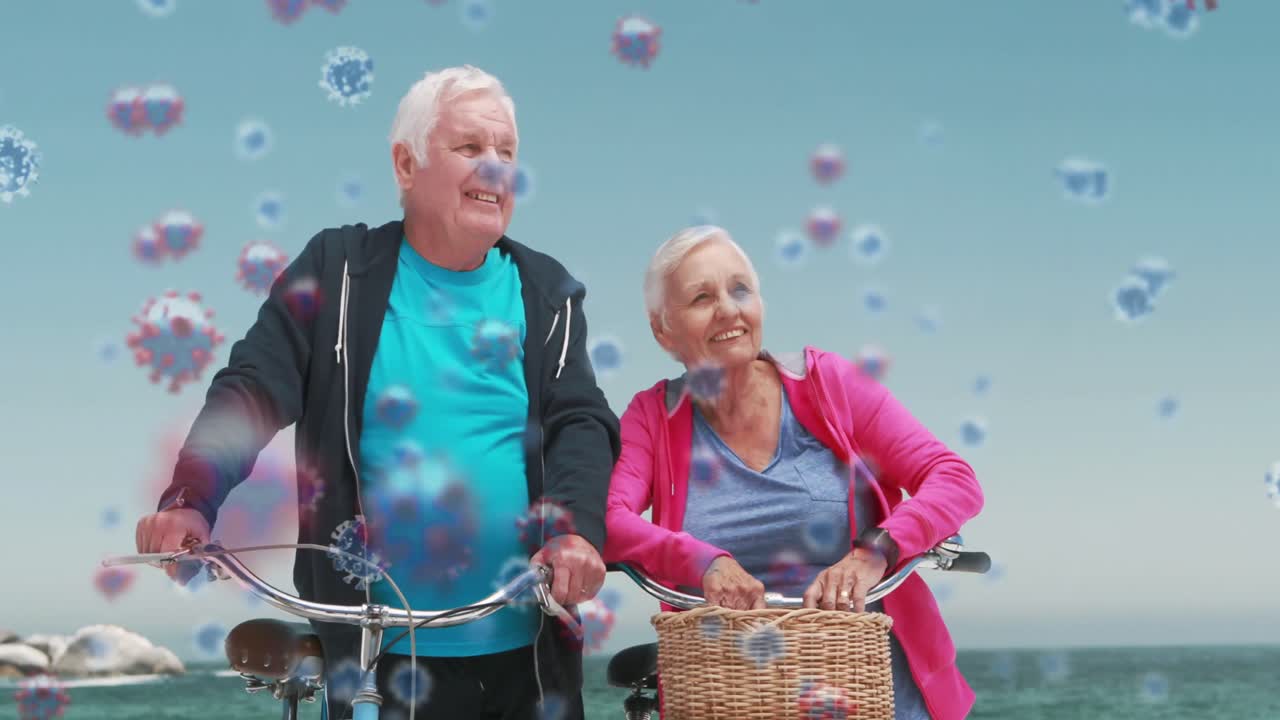анимация макрокоронавирусных клеток covid-19, распространяющихся на пожилую кавказскую пару, катающуюся на велосипеде
