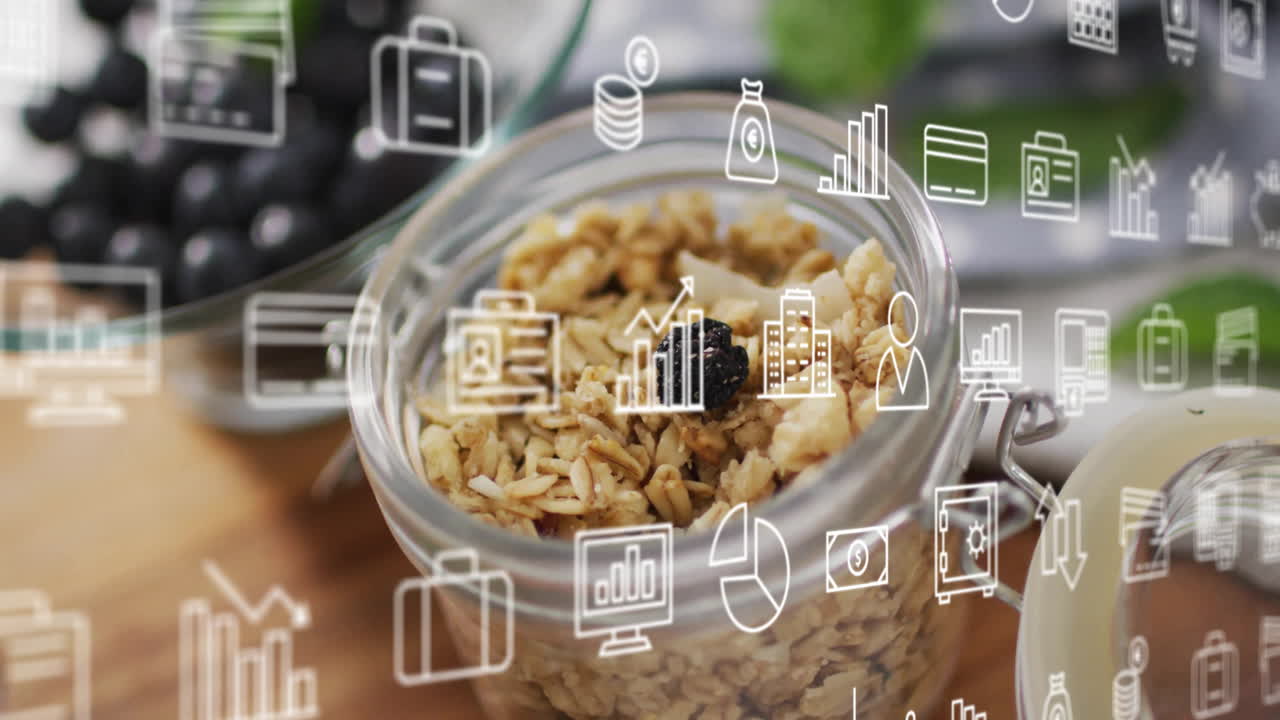 Digital business icons overlaying scene with granola in jar on table