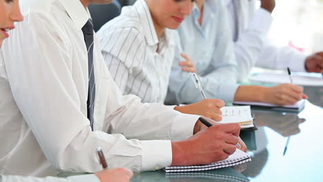 Camera-panning-up-showing-a-business-team