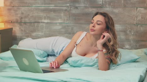 zoom out shot of beautiful woman wearing pajamas