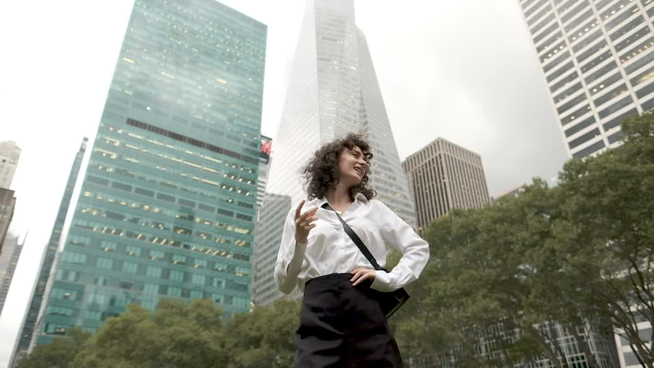 Happy Young Woman Dancing. NY.