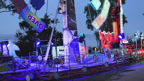 colorful ride swinging at night in amusement park