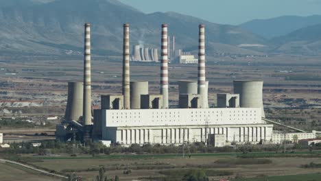 Coal-fired-power-station-plant-with-no-smoke-sunny-day-Clear-sky-Medium-shot