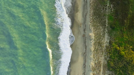 rough sea with beach nature background overhead vertical relaxing in sicily