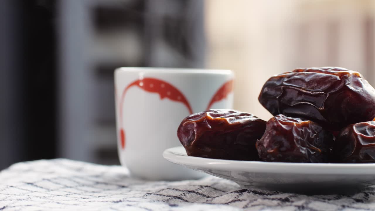 Dates and a cup
