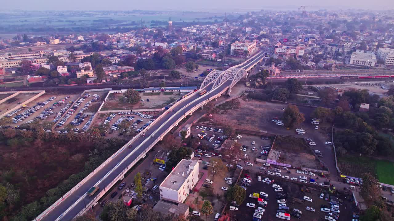 ayodhya parking area view with Railway Overbridge and trees at day time, push in, drone shot, 4k.