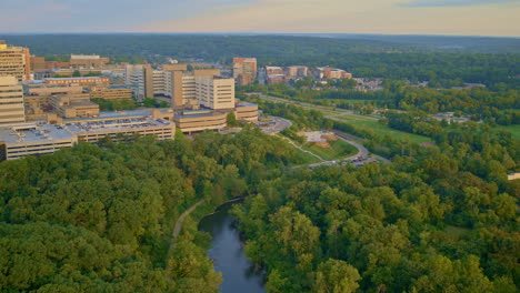 aerial view of a university campus with hospital and green space