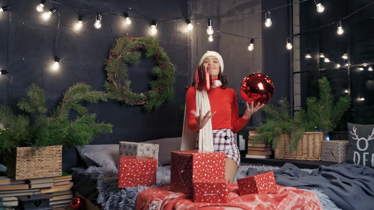 Woman In Christmas Sweater. Cheerful attractive woman having fun during Christmas