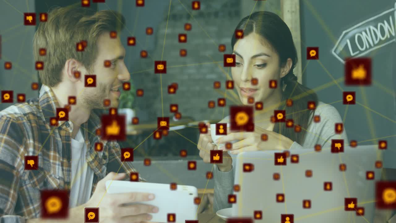 Man tapping tablet screen and showing social media stats to coworker, animated icons emerging