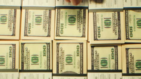 stacks of cash dollars and euro, banknotes counting, specialised police officer counting dollar euro banknotes in crime lab with machine, cashed out money, bitcoin changing, buying home flat in bank.