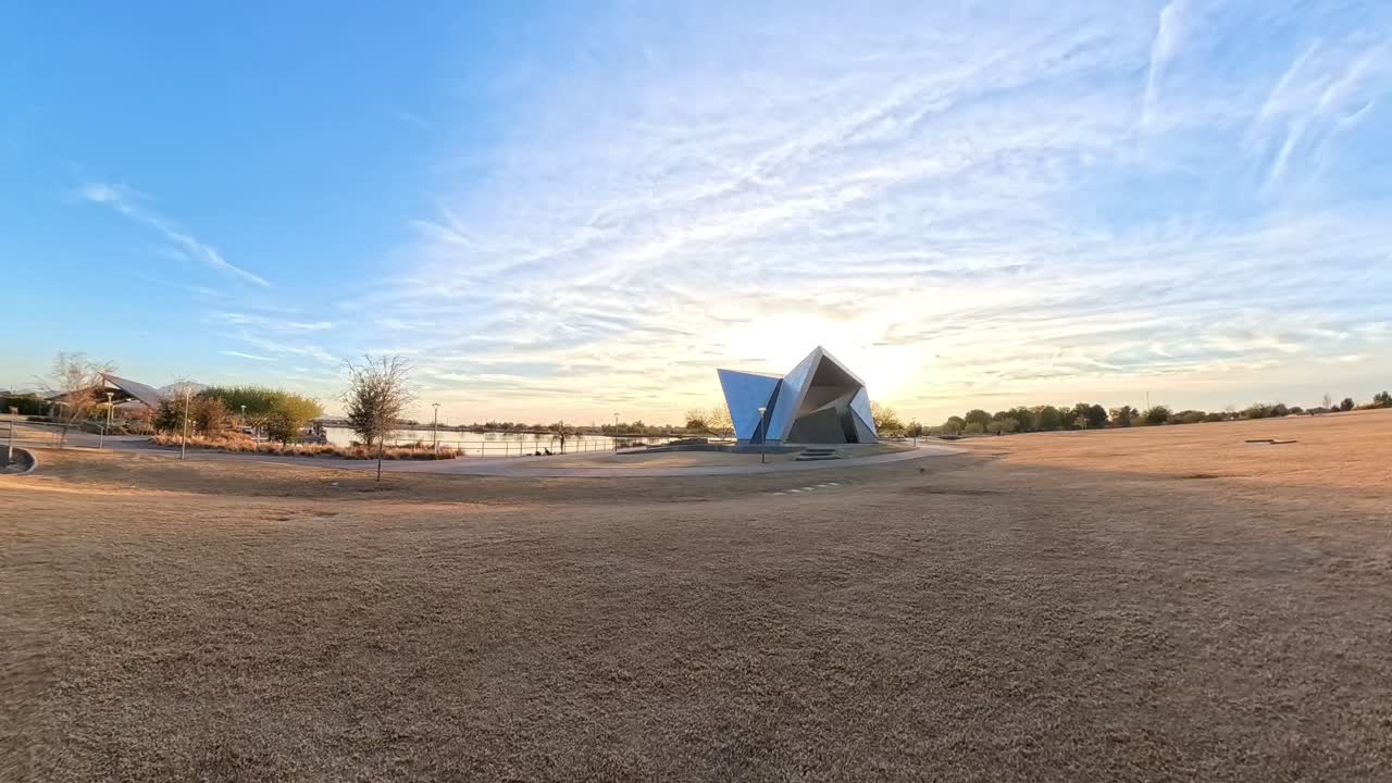 Panning Time lapse of Gilbert Amphitheater a modern geometric shaped monument.