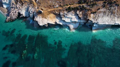 unveiling the hidden beauty of lukova seashore: turquoise ionian sea embracing white marble rocks in a summer paradise