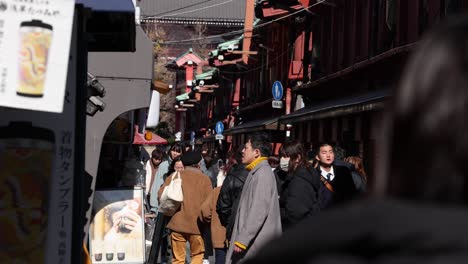 pedestrians walking through a busy street