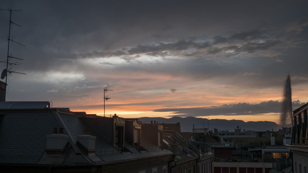 Sunset time-lapse over the rooftops of Geneva, Switzerland